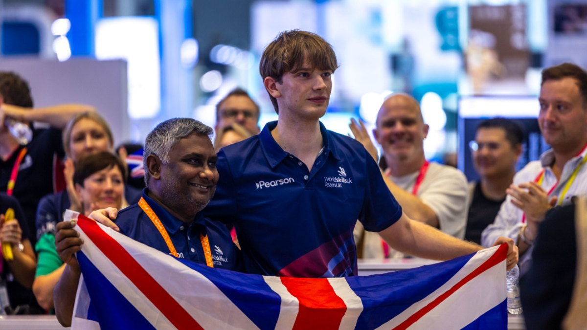 Charlie holding a British flag at the competition